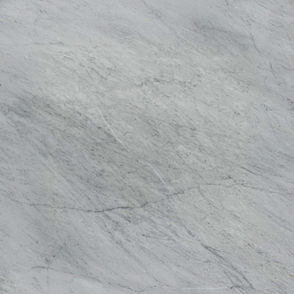 Texture visuelle du bianco carrara c qui est un marbre blanc avec de fines veines grises